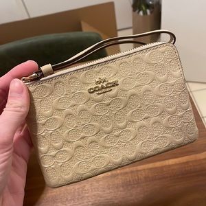 Coach wristlet (cream/tan)